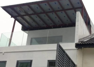 Aluminum roof awning installed on the top floor of a building