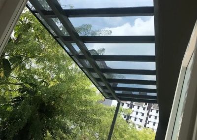 Glass roof awning installed in a residential area