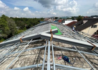 Installing a new metal roof structure on a commercial building