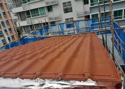 New roof installed with clay shingles, viewed from a slope