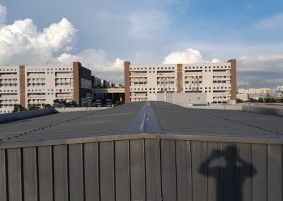 Wide-angle view of Kliplok metal roofing installed on a warehouse