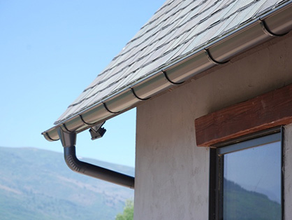 painting roof shingles with full safety